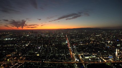 OSAKA, JAPAN - CIRCA SEPTEMBER 2019 : Aerial high angle view of CITYSCAPE of OSAKA in early evening sunset time. Osaka is the second largest metropolitan area in Japan.