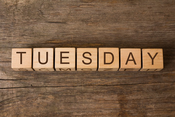 The word tuesday on wooden cubes