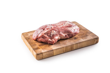 Pork neck raw meat on butcher board isolated on white background