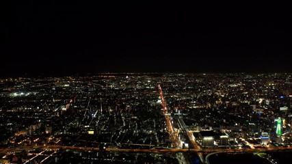 OSAKA, JAPAN - CIRCA SEPTEMBER 2019 : Aerial high angle view of CITYSCAPE of OSAKA in night time. Osaka is the second largest metropolitan area in Japan.