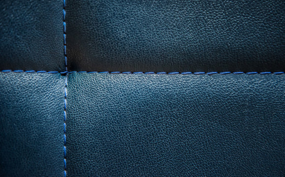 Shiny dark blue leather surface background