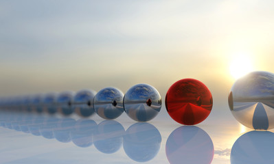 Concept or conceptual row of balls with a red one standing out on blue background as a metaphor for creativity, personality and independence A leadership, courage and action or success 3d illustration