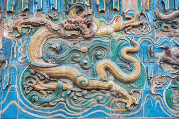Yellow dragon on the nine dragon wall in the old town of Pingyao