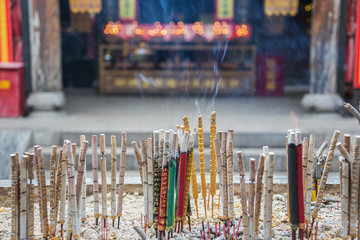 Close up of smoking incense sticks in the City God Temple in the old town of Pingyao