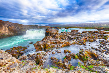Incredible landscape scene of powerful Godafoss waterfall.
