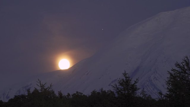 Full moonrise over the Tolbachik volcano. Kamchatka Peninsula, Russia