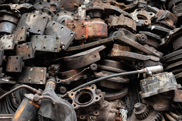 Old engine parts, steel and used car parts, for engineering. Selective focus.