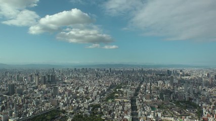 OSAKA, JAPAN - CIRCA SEPTEMBER 2019 : Aerial high angle view of CITYSCAPE of OSAKA in daytime. Osaka is the capital city of Osaka Prefecture and the second largest metropolitan area in Japan.