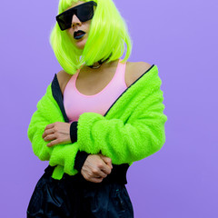Fashion hipster Model. Clubbing style. Street swag outfit. Neon acid mood