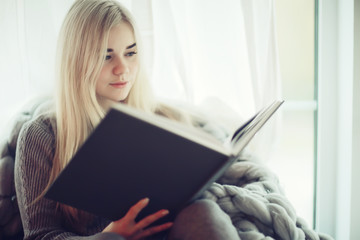 knitted plaid window girl reading a book,  young woman reading at home, romance, learning, student, autumn interior