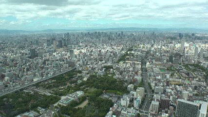 OSAKA, JAPAN - CIRCA SEPTEMBER 2019 : Aerial high angle view of CITYSCAPE of OSAKA in daytime. Osaka is the capital city of Osaka Prefecture and the second largest metropolitan area in Japan.