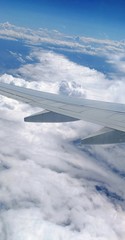 aerial view of white clouds from a plane window 