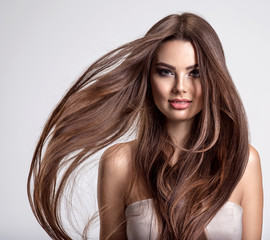 Portrait of a beautiful woman with a long hair.