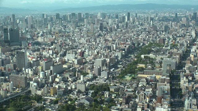 OSAKA, JAPAN - CIRCA SEPTEMBER 2019 : Aerial high angle view of CITYSCAPE of OSAKA in daytime. Osaka is the capital city of Osaka Prefecture and the second largest metropolitan area in Japan.