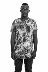 Fototapeta na wymiar Studio shot of young African man in black and white