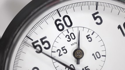 Macro close up detail of vintage stop watch.