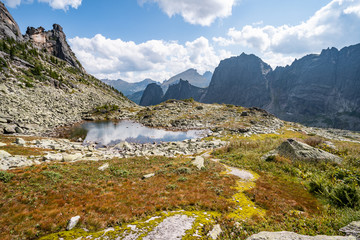 Gorgeous panoramic view on top of western Sayan mountain range in Ergaki national park, Siberia, Russia