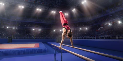 Fotobehang Male athlete doing a complicated exciting trick on parallel bars in a professional gym. Man perform stunt in bright sports clothes © Alex