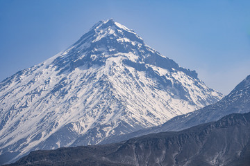 volcanic landscape: view on Kamen Volcano, active Klyuchevskoy Volcano and active Bezymianny Volcano