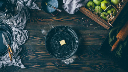 Apple pie making process, greasing baking mold