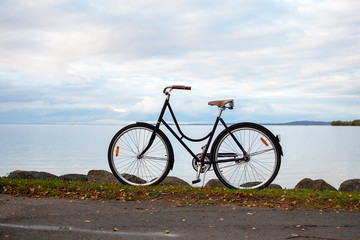 Fototapeta premium Bike by the water in the fall.