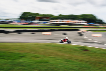 Obraz premium Go Kart driving training racing in provocative style.Panning images and motion blur.