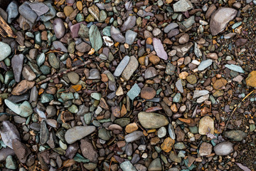 The texture of a shallow river stone. Pebble Background Image