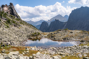 Gorgeous view on top of western Sayan mountain range during summer sunny day in Ergaki national park, Siberia, Russia