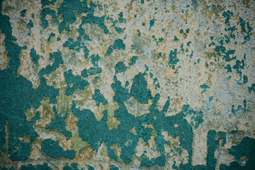 Texture of an old wall covered with paint. Background image of a worn paint coated surface