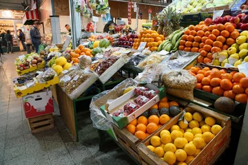 Foto op Canvas Market stall with colorful fruits and vegetable © pattilabelle