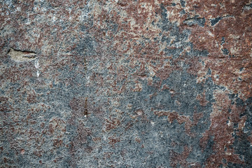 Texture of an old wall covered with paint. Background image of a worn paint coated surface