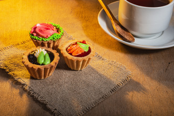 Still life tea. Top view- cup, sugar, spoon