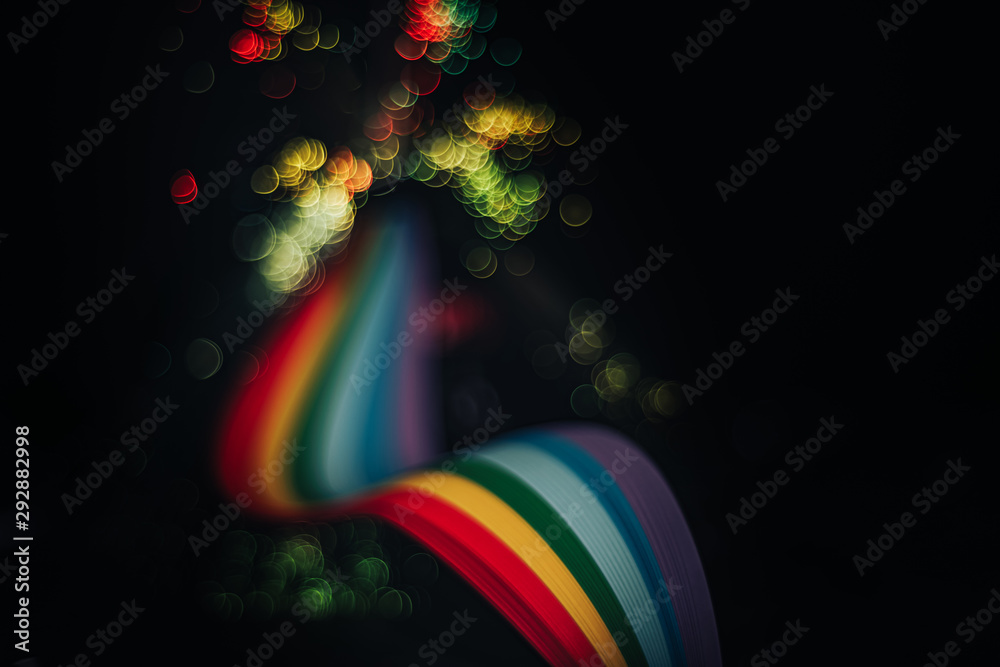 Poster Beautiful abstract rainbow bridge and multi colored space background in the darkness.