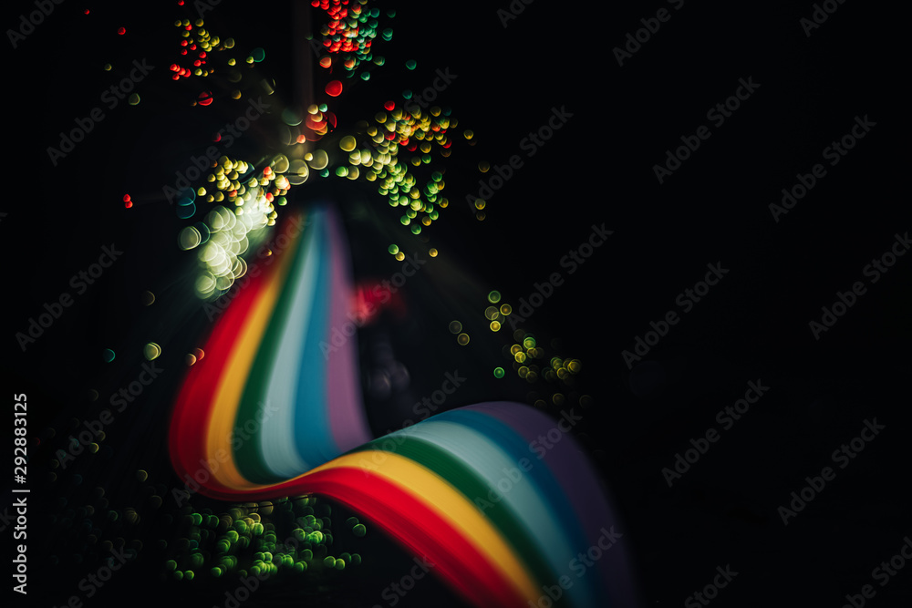 Aufkleber beautiful abstract rainbow bridge and multi colored space background in the darkness.