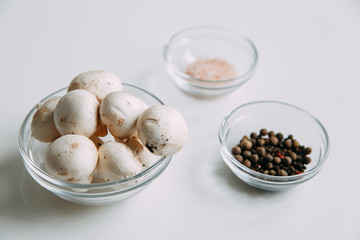 Content and macro photography for food blog. Preparation and scattering of mushrooms on the table.