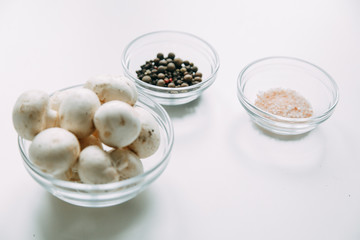 Content and macro photography for food blog. Preparation and scattering of mushrooms on the table.