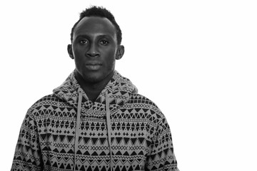 Studio shot of young African man in black and white
