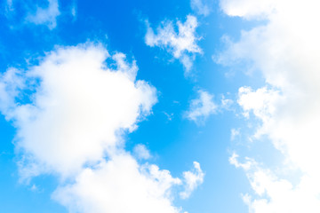 Nature Bright blue Sky with white clouds on blackground. Beautiful sky and clouds in the afternoon.