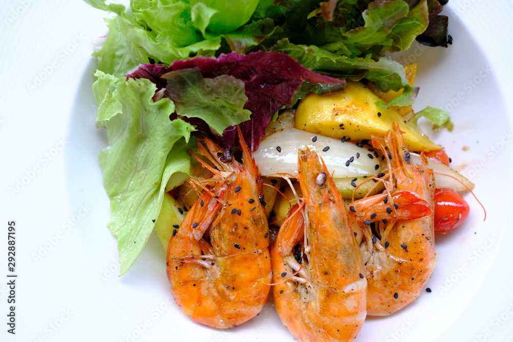 Canvas Prints mango salad with shrimp on wood table