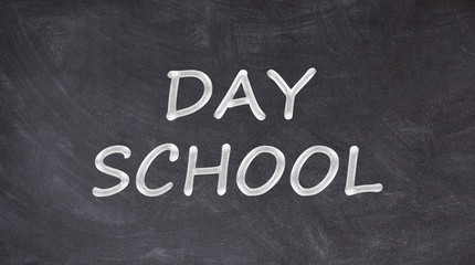 Day school written on blackboard