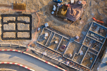 Aerial view over a construction site of new homes being built
