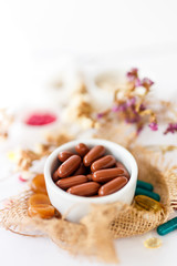 Nutritional supplements and vitamins on white background. Medicines for health support. Pills and supplements for people health.