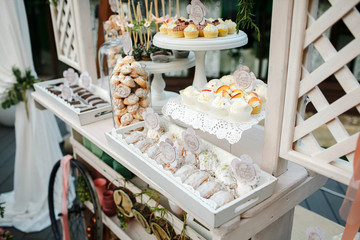 Candy bar decorated with bricks and cookies.