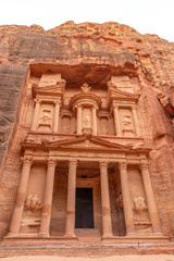 Al Khazneh. It is the treasury in Petra ancient city. Petra is the main attraction of Jordan. Petra is included in the UNESCO heritage list.