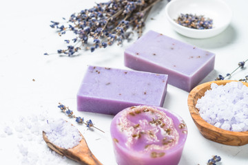 Lavender soap bars on white top view.