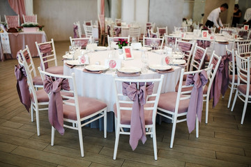 Fototapeta na wymiar Table arranged with for the event. Interior texture.