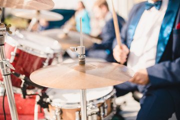 Drum set during a concert - drummer plays jazz