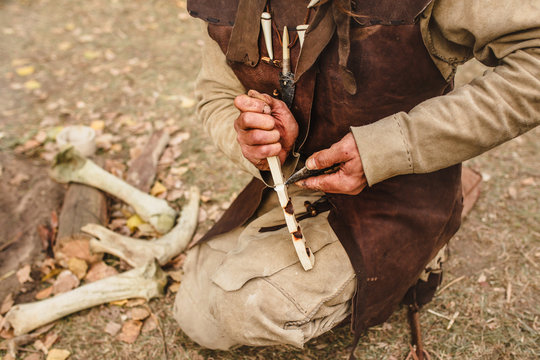 Demonstration Of Life And Lifestyle In The Stone Age - A Man Makes Fire