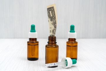 Dollar in the medical bottle
