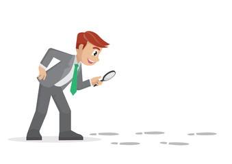 Businessman holding a magnifying glass follow footprint.